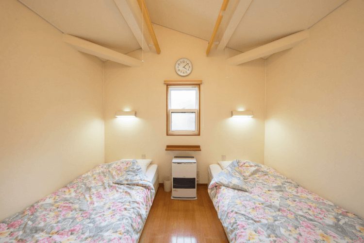 ヴィラ・フォレストのベッドが2つある部屋